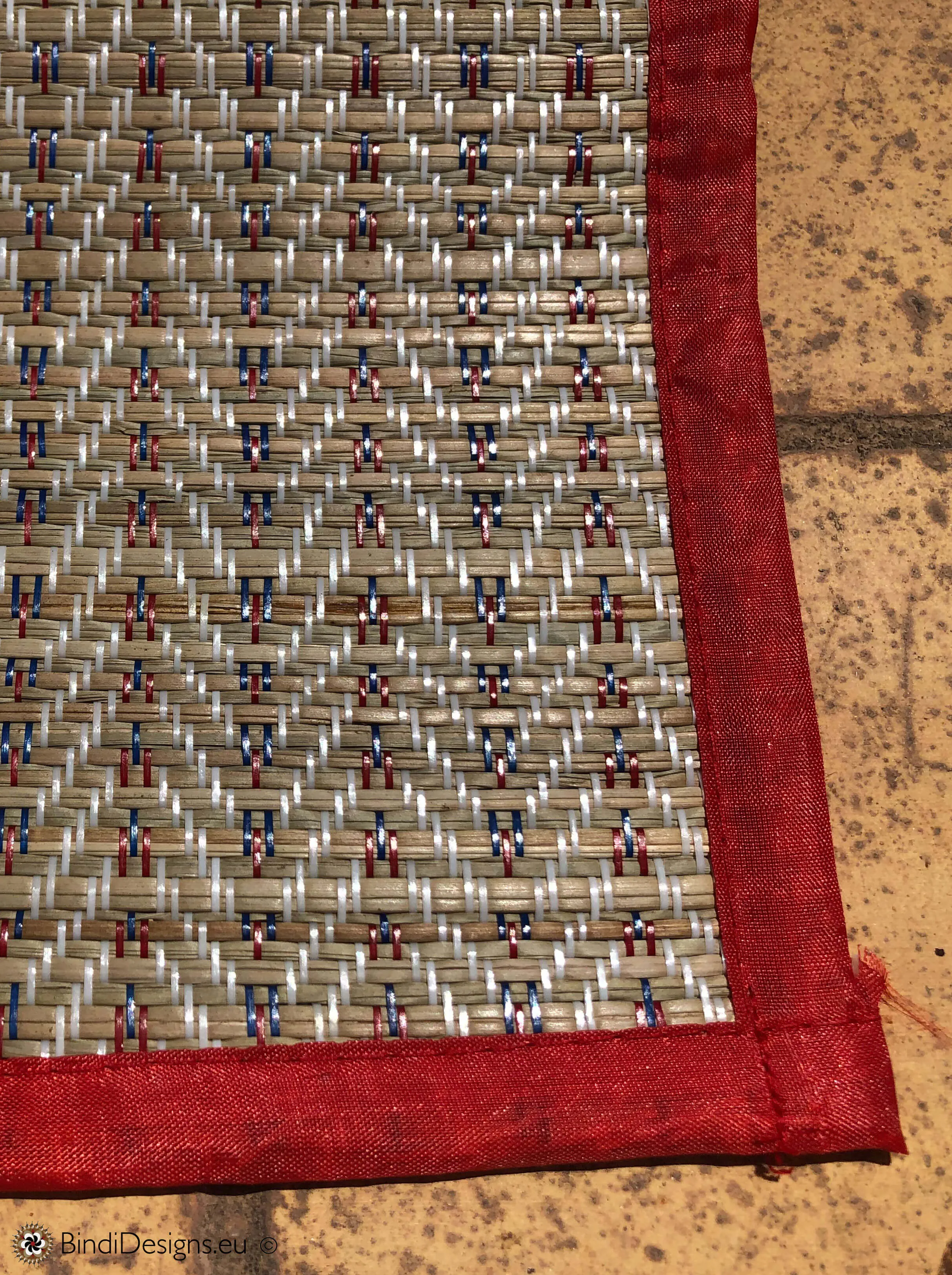 Handwoven Natural Reed Fold up Mat with Red Trim