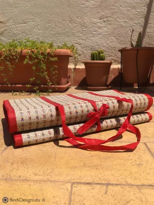 Handwoven Natural Reed Fold up Mat with Red Trim